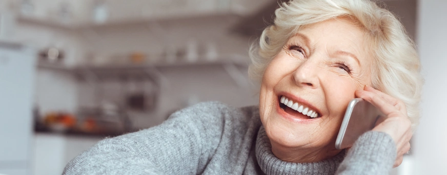 Life Assure Senior Grandmother Talking On Phone Hero